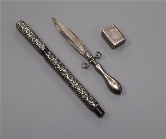 A William IV silver vinaigrette, a silver dagger book mark and an embossed silver fountain pen